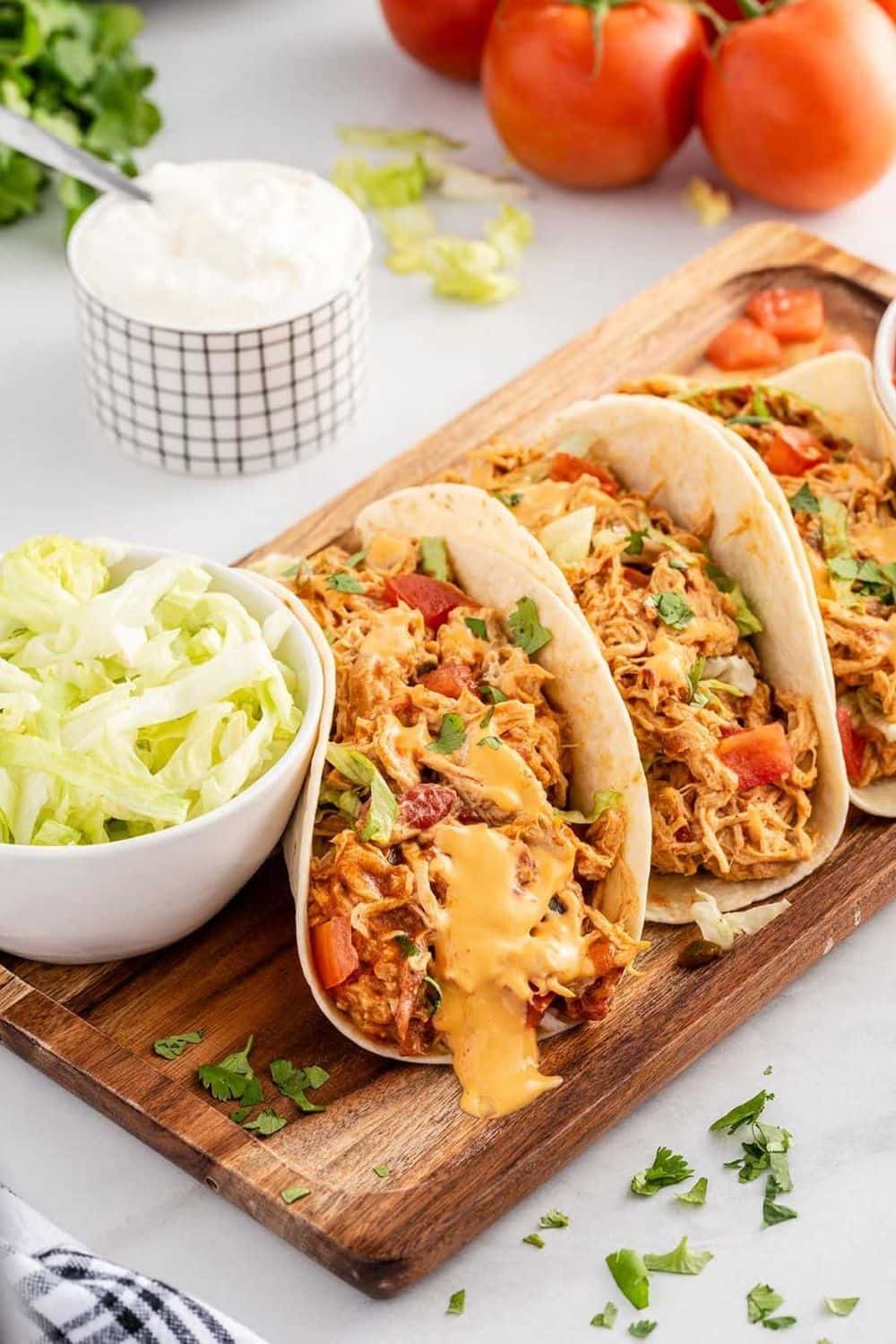 Slow Cooker Queso Chicken Tacos